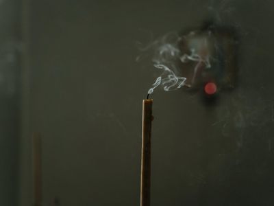Incense smoke in a tranquil workout environment.